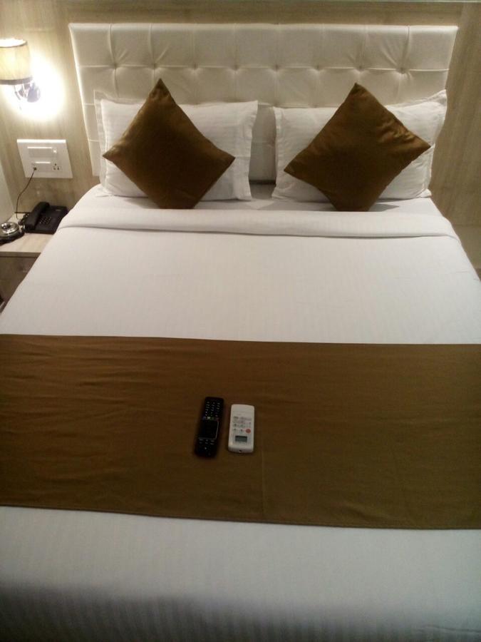 Hotel Grace Inn Mumbai Zimmer foto